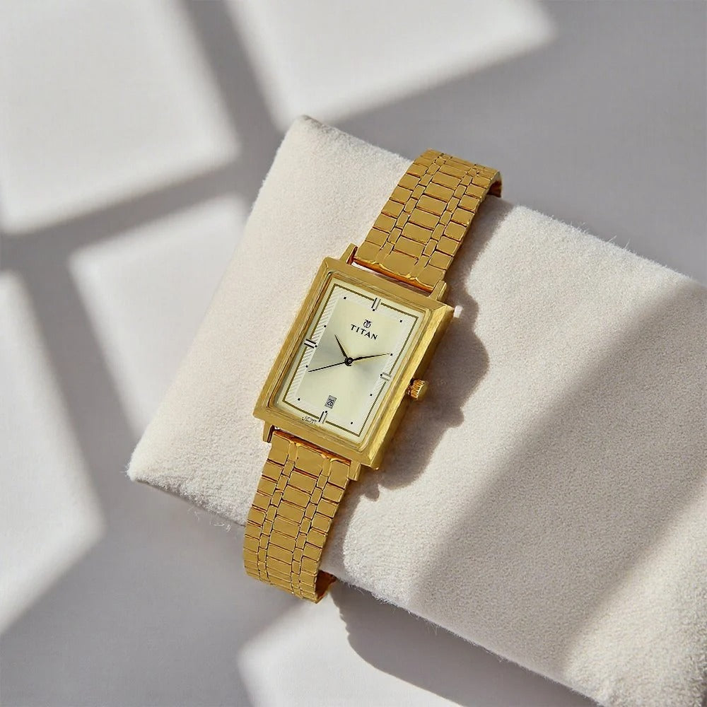 Titan Quartz Analog with Date Champagne Dial Golden Stainless Steel Strap Rectangular Shaped Watch For Men - NU1715YM02